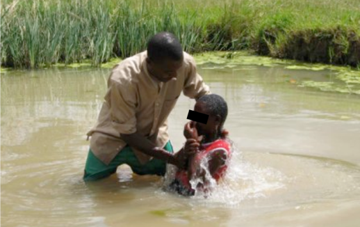 Figure 2: Full immersion Christian water baptism. Credit: DailyAdvent